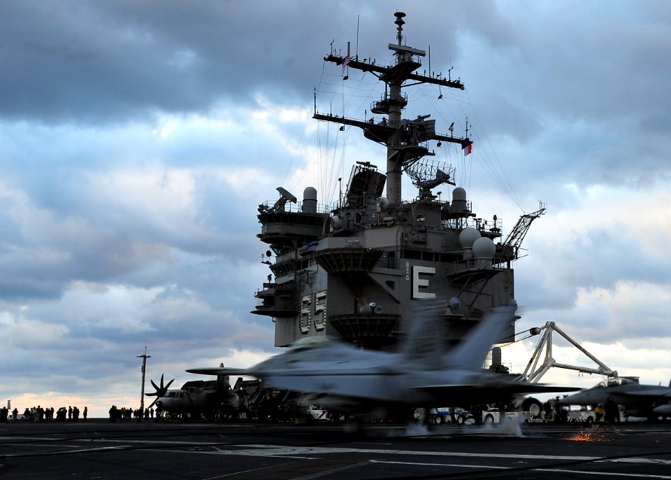 US Navy 101209-N-0569K-068 An F-A-18F Super Hornet lands aboard USS Enterprise (CVN 65)