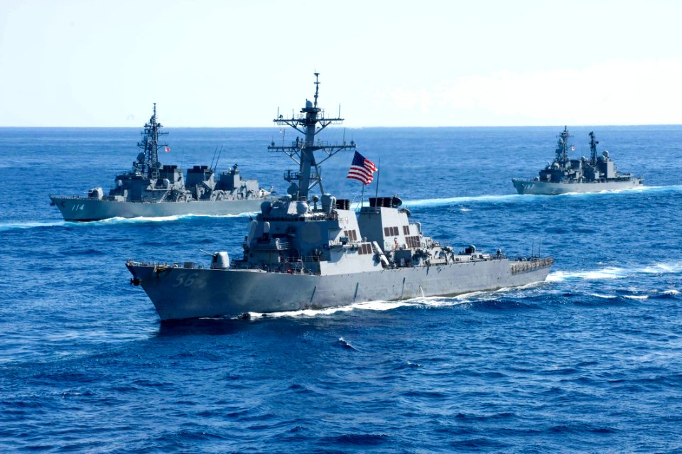 US Navy 101210-N-9626Y-052 USS John S. McCain (DDG 56) joins a combined formation of twenty-six Japan Maritime Self-Defense Force (JMSDF) and U.S