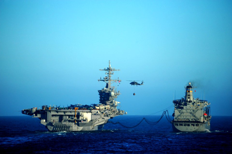 US Navy 101208-N-6006S-002 The aircraft carrier USS Carl Vinson (CVN 70) conducts a replenishment at sea with the Military sealift Command fleet re