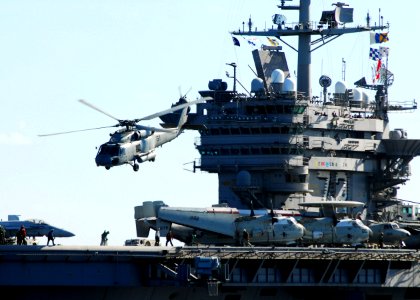 US Navy 101210-N-2218S-041 An SH-60F Sea Hawk helicopter takes off from the flight deck of the aircraft carrier USS George Washington (CVN 73) duri