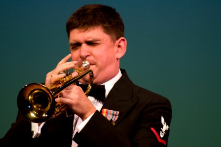 US Navy 101212-N-5758H-031 Musician 3rd Class Zach Conway plays the trumpet during the U.S. 7th Fleet Band, Far East Edition's Friendship Concert