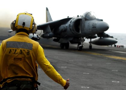 US Navy 101209-N-2218S-056 An AV-8B Harrier jet aircraft prepares to take off aboard the amphibious assault ship USS Essex (LHD 2) to take part in