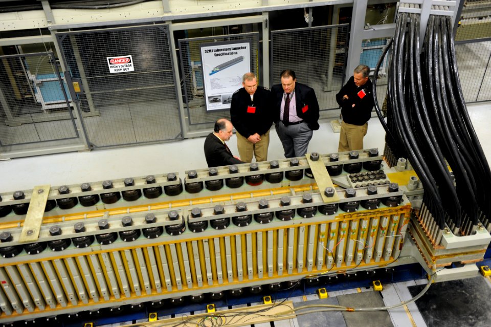 US Navy 101210-N-7676W-032 Charles Garnett, left, Naval Surface Warfare Center Dahlgren Division Electromagnetic Railgun project manager, briefs Vi