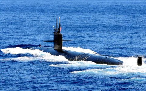 US Navy 101210-N-5538K-056 The Los Angeles-class attack submarine USS Houston (SSN 713) takes part in a photo exercise at the conclusion of exercis