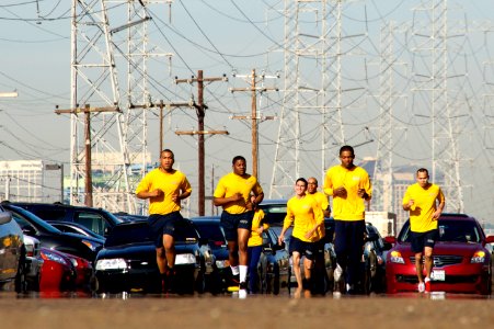 US Navy 101209-N-9643K-972 Sailors erform the 1.5-mile run portion of the semi-annual physical fitness test at Naval Base San Diego