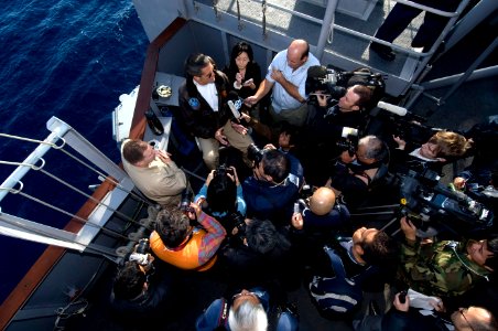 US Navy 101210-N-9626Y-004 A group of international media interviews USS George Washington's (CVN 73) Commanding Officer, Capt. David Lausman on th