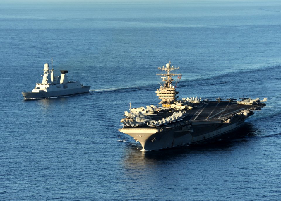 US Navy 101210-N-1261P-007 The aircraft carrier USS Abraham Lincoln (CVN 72), right, and the French navy destroyer Forbin (D 620) are underway toge