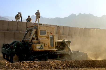 US Navy 101211-N-6436W-085 Active duty and reserve component Seabees assigned to Naval Mobile Construction Battalions 40, 18 and 26 secure and fort