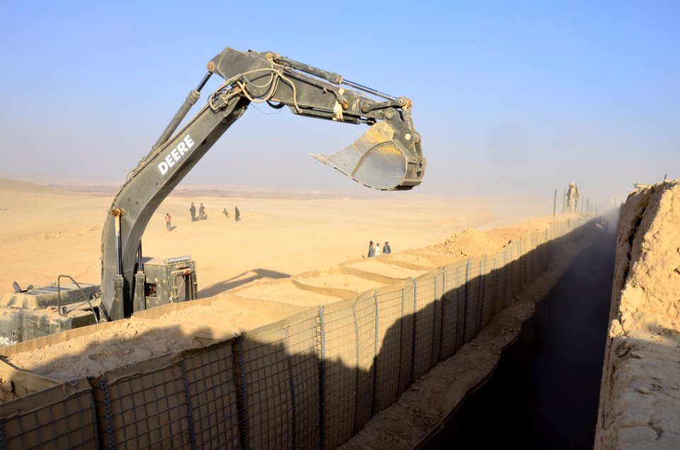 US Navy 101211-N-6436W-069 Active duty and reserve component Seabees assigned to Naval Mobile Construction Battalions 40, 18 and 26 secure and fort