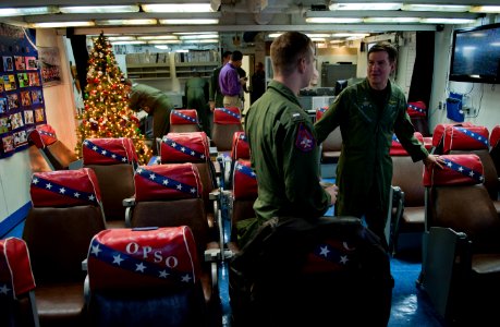 US Navy 101214-N-7981E-360 Vice Adm. Allen G. Myers speaks with pilots assigned to (VFA) 22 aboard USS Carl Vinson (CVN 70)