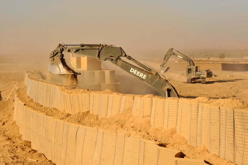 US Navy 101211-N-6436W-098 Active duty and reserve component Seabees assigned to Naval Mobile Construction Battalions 40, 18 and 26 secure and fort