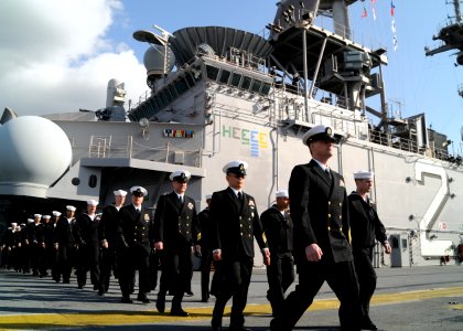 US Navy 101214-N-0120A-021 The crew of the forward-deployed amphibious assault ship USS Essex (LHD 2), lead by Senior Chief Personnel Specialist Cl