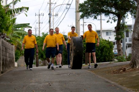 US Navy 101212-N-5758H-014 Lt. Jeff Wrenn, left, Musician 3rd Class Charlie Perkes, Senior Chief Musician Adam Vincent