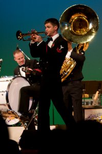 US Navy 101212-N-5758H-033 Musician 2nd Class Colin Reichow plays the trumpet during the U.S. 7th Fleet Band, Far East Edition's Friendship Concert photo