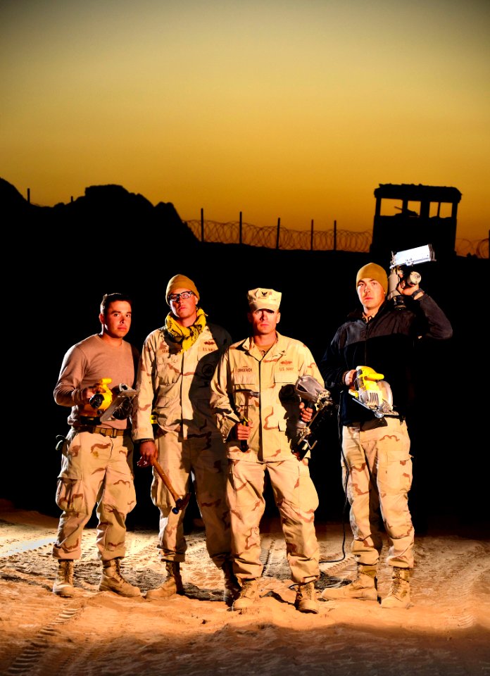 US Navy 101212-N-6436W-100 Active duty and reserve component Seabees assigned to Naval Mobile Construction Battalions 40, 18 and 26 are building fo