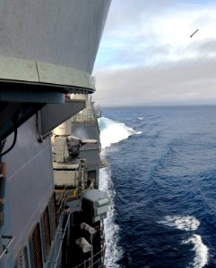US Navy 101216-N-6006S-098 super rapid blooming off board chaff (SROBC) canister is fired during a test exercise aboard the guided-missile cruiser