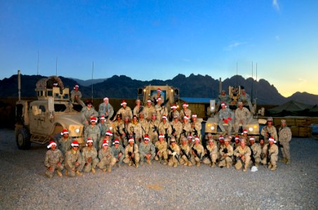 US Navy 101213-N-6436W-095 Active duty and reserve component Seabees assigned to Naval Mobile Construction Battalions 40, 18 and 26 pose for a grou