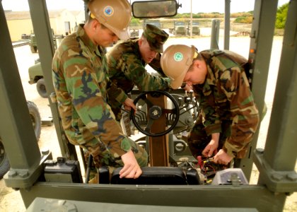 US Navy 101212-N-9564W-058 Construction Mechanic 3rd Class Matthew LaForest, right, and Construction Mechanic Constructionman Matthew O'Brien, both