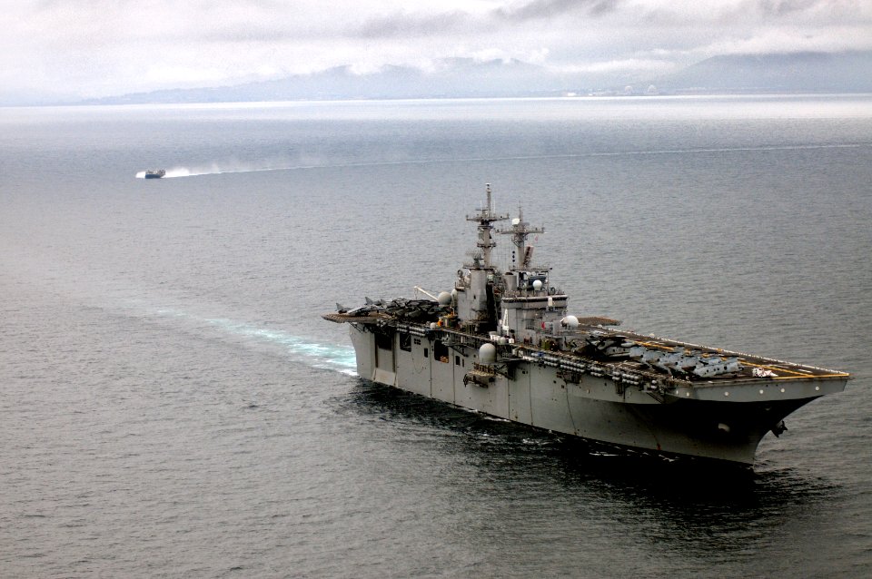 US Navy 101215-N-6552M-180 A landing craft air cushion (LCAC) approaches the amphibious assault ship USS Boxer (LHD 4) for docking. Boxer, as part
