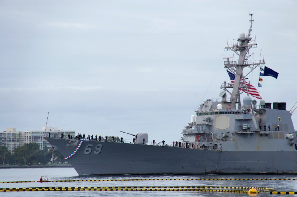 US Navy 101216-N-9643K-200 Sailors man the rails aboard USS Milius (DDG 69)