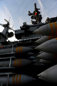 US Navy 101217-N-2475A-261 Stacked ordnance sits on the pier at Indian Island ready to be loaded aboard the aircraft carrier USS John C. Stennis (C