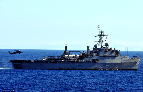 US Navy 101213-N-7948R-003 An MH-60S Sea Hawk helicopter approaches the flight deck of the amphibious transport dock ship USS Dubuque (LPD 8) durin