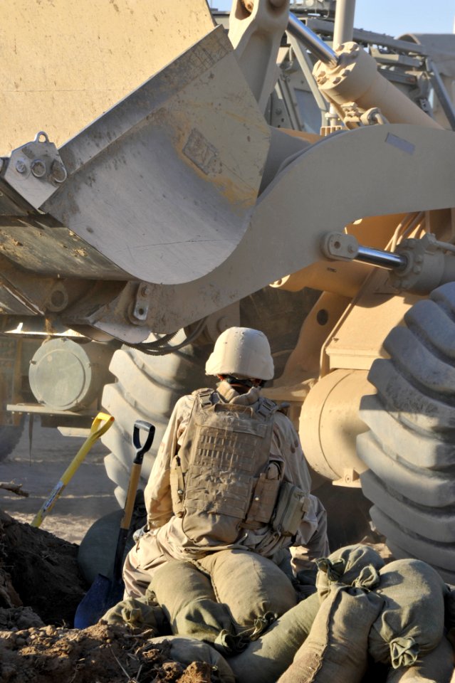US Navy 101218-N-6436W-183 Active duty and reserve component Seabees assigned to Naval Mobile Construction Battalions 40, 18 and 26 secure and fort