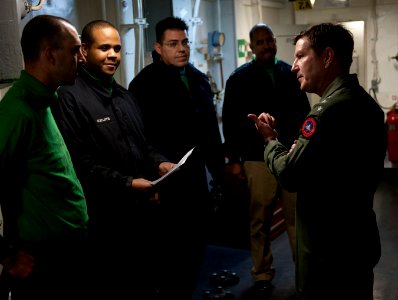 US Navy 101214-N-7981E-394 Vice Adm. Allen G. Myers speaks to Sailors in an arresting gear machinery room during a visit to USS Carl Vinson (CVN 70