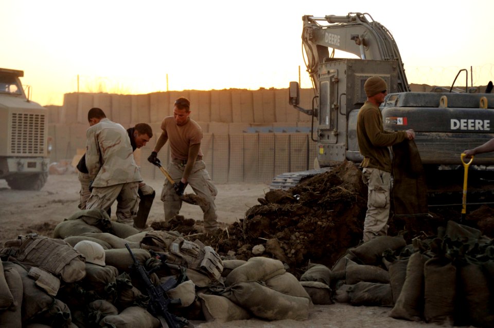 US Navy 101218-N-6436W-193 Active duty and reserve component Seabees assigned to Naval Mobile Construction Battalions 40, 18 and 26 secure and fort