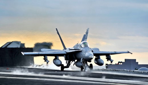 US Navy 101218-N-6003P-181 An F-A-18C Hornet assigned to the Ragin' Bulls of Strike Fighter Squadron (VFA) 37 launches from the aircraft carrier US