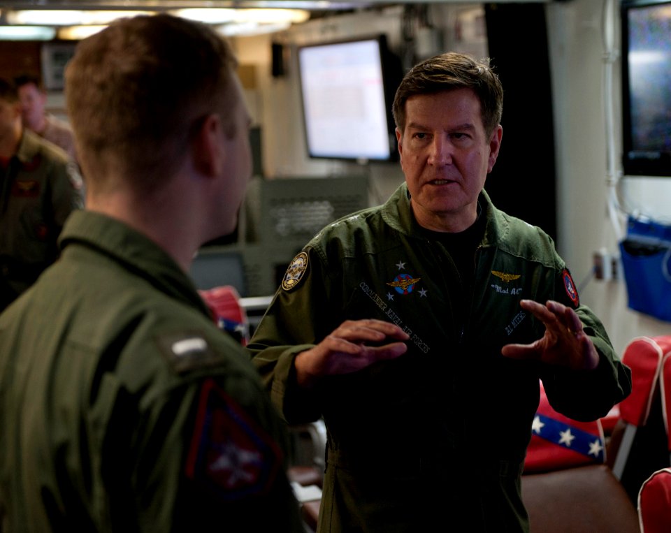 US Navy 101214-N-7981E-351 Vice Adm. Allen G. Myers speaks with pilots assigned (VFA) 22 aboard USS Carl Vinson (CVN 70)