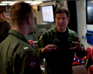 US Navy 101214-N-7981E-351 Vice Adm. Allen G. Myers speaks with pilots assigned (VFA) 22 aboard USS Carl Vinson (CVN 70)