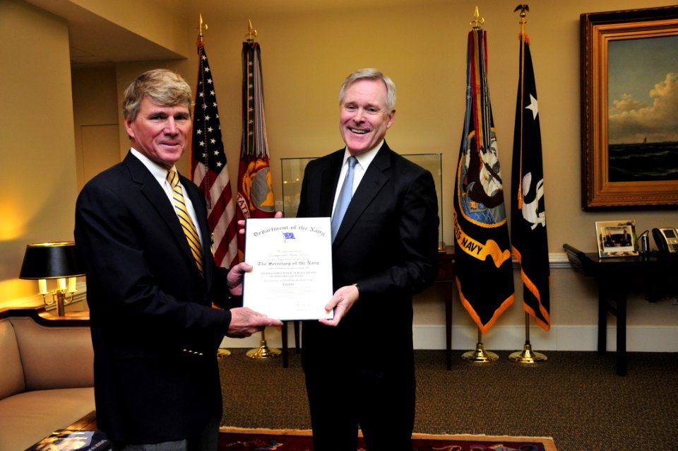 US Navy 101214-N-8273J-013 Secretary of the Navy (SECNAV) the Honorable Ray Mabus, right, awards the Distinguished Public Service Award to U.S. Con