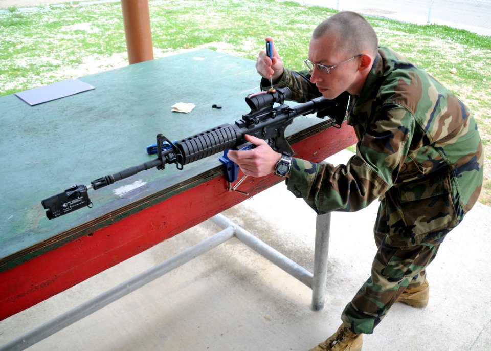 US Navy 101220-N-9564W-060 Gunner's Mate 2nd Class Joshua Sanders, assigned to Naval Mobile Construction Battalion (NMCB) 74, Headquarters Company