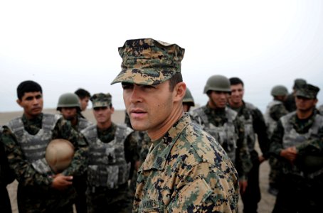 US Navy 101215-N-2984R-771 Marine Staff Sgt. Daniel Monteiro, center, an instructor assigned to Marine Corps Training and Advisory Group