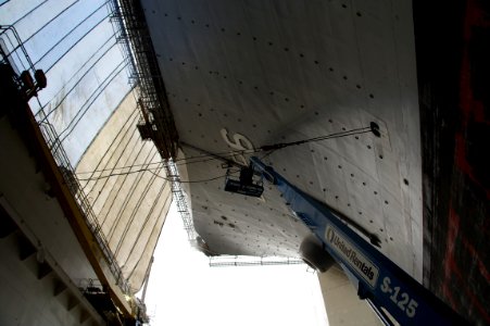 US Navy 101221-N-9643K-397 Hull preservation and upgrades are in progress aboard the amphibious assault ship USS Bonhomme Richard (LHD 6)