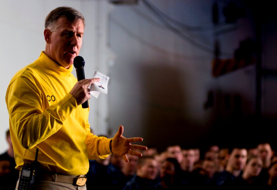 US Navy 101222-N-2953W-127 Capt. Bruce H. Lindsey, commanding officer of the aircraft carrier USS Carl Vinson (CVN 70), addresses the crew in the s