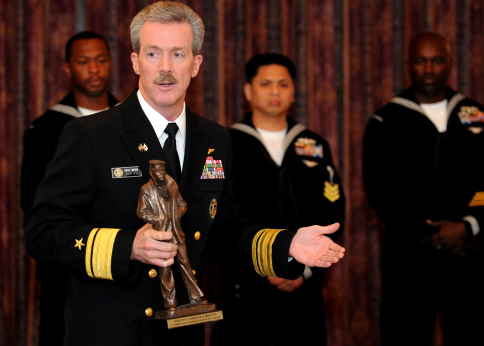 US Navy 101216-N-3283P-001 Rear Adm. Rick Wren addresses Navy Region Japan senior enlisted leaders during a Sailor of the Year luncheon ceremony