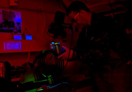 US Navy 101220-N-7981E-390 Aviation Structural Mechanic 1st Class Charles Martens, a non-destructive inspection (NDI) technician