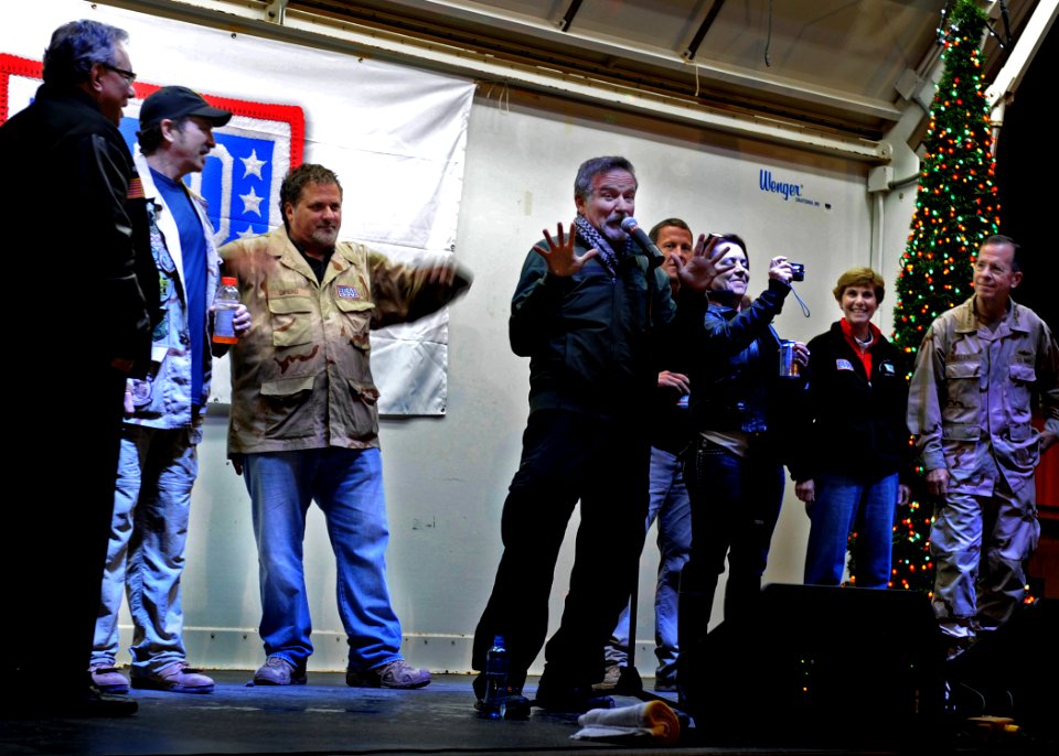 US Navy 101217-N-6266K-252 omedian Robin Williams is joined on stage by fellow United Service Organizations, entertainers, and Chairman of the Join