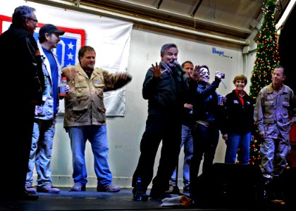 US Navy 101217-N-6266K-252 omedian Robin Williams is joined on stage by fellow United Service Organizations, entertainers, and Chairman of the Join