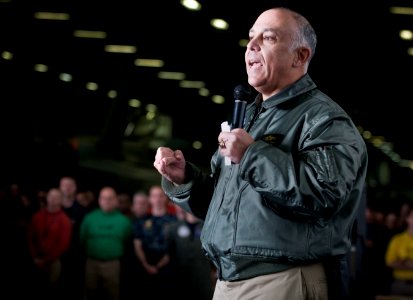 US Navy 101222-N-2055M-363 Rear Adm. Sam Perez, commander of Carrier Strike Group (CSG) 1, addresses Sailors during a frocking ceremony and all-han