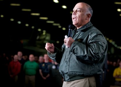 US Navy 101222-N-2055M-363 Rear Adm. Sam Perez, commander of Carrier Strike Group (CSG) 1, addresses Sailors during a frocking ceremony and all-han photo