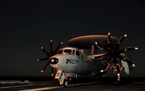 US Navy 101219-N-5016P-002 An E-2C Hawkeye is chained to the flight deck aboard USS Abraham Lincoln (CVN 72)