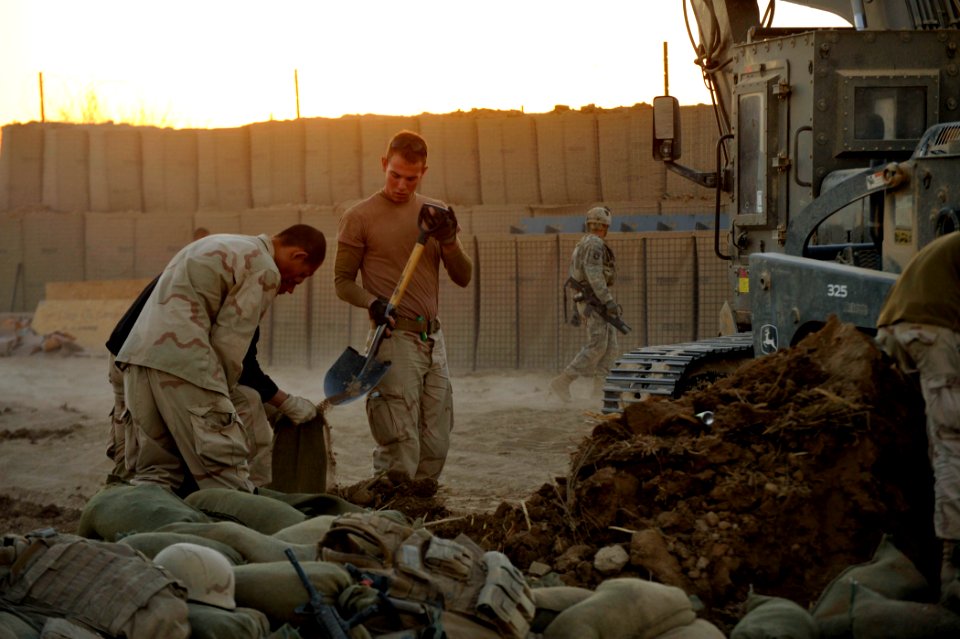 US Navy 101218-N-6436W-191 Active duty and reserve component Seabees assigned to Naval Mobile Construction Battalions 40, 18 and 26 secure and fort