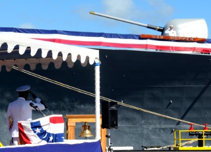 US Navy 110121-N-3666S-119 Capt. Richard Clemmons orders his pennant lowered aboard the guided-missile destroyer USS Hopper (DDG 70) during a chang