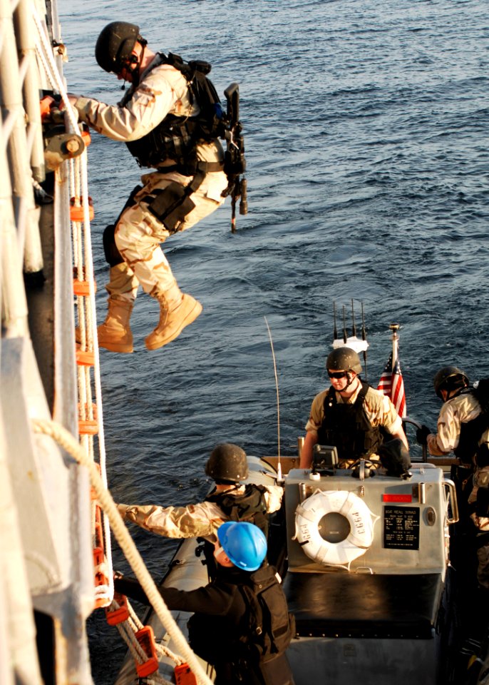 US Navy 110130-N-2686K-272 Members of the visit, board, search and seizure team, assigned to the guided-missile cruiser USS Gettysburg (CG 64)