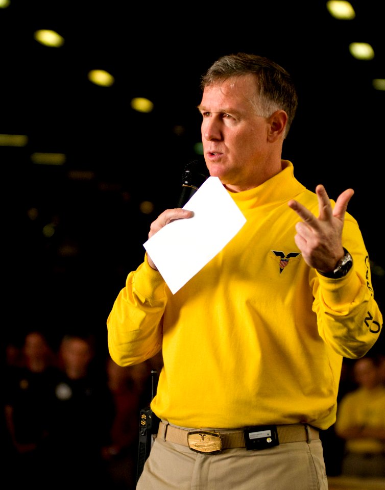 US Navy 101222-N-2953W-117 Capt. Bruce H. Lindsey, commanding officer of the aircraft carrier USS Carl Vinson (CVN 70), addresses the crew in the s