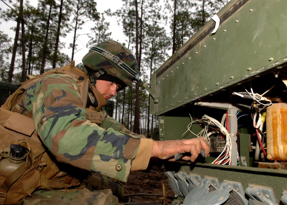 US Navy 110125-N-8816D-017 Construction Electrician Constructionman Zachary Snyder, assigned to Naval Mobile Construction Battalion (NMCB) 133, set