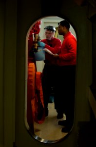 US Navy 101224-N-7981E-661 Sailors perform scheduled maintenance on a fire station